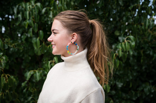 How to wear big earrings with a rolled necked jumper