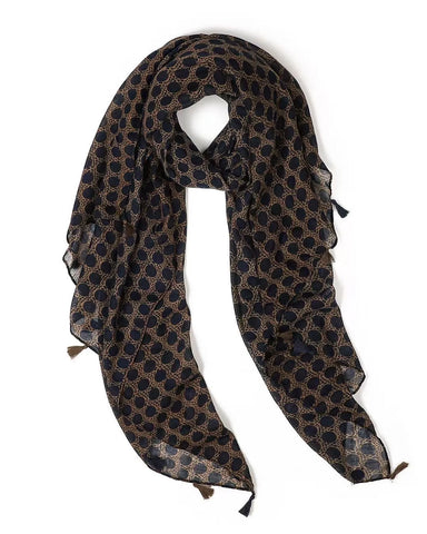 black spotted scarf on tan background