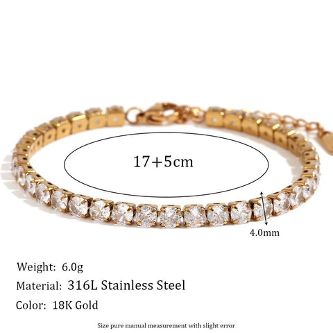 Close-up of the gold tennis bracelet's crystal stones and clasp on a white background.