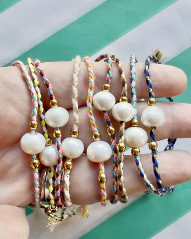 Freshwater Pearl Cord Bracelet featuring genuine freshwater pearls on an adjustable plaited cotton cord