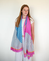 Introducing this geometric scarf – the lightweight, year-round essential that's all about fun and fashion! Featuring a fantastic palette of pinks, blues, orange and white, this scarf is as versatile and the perfect addition to your spring outfits.