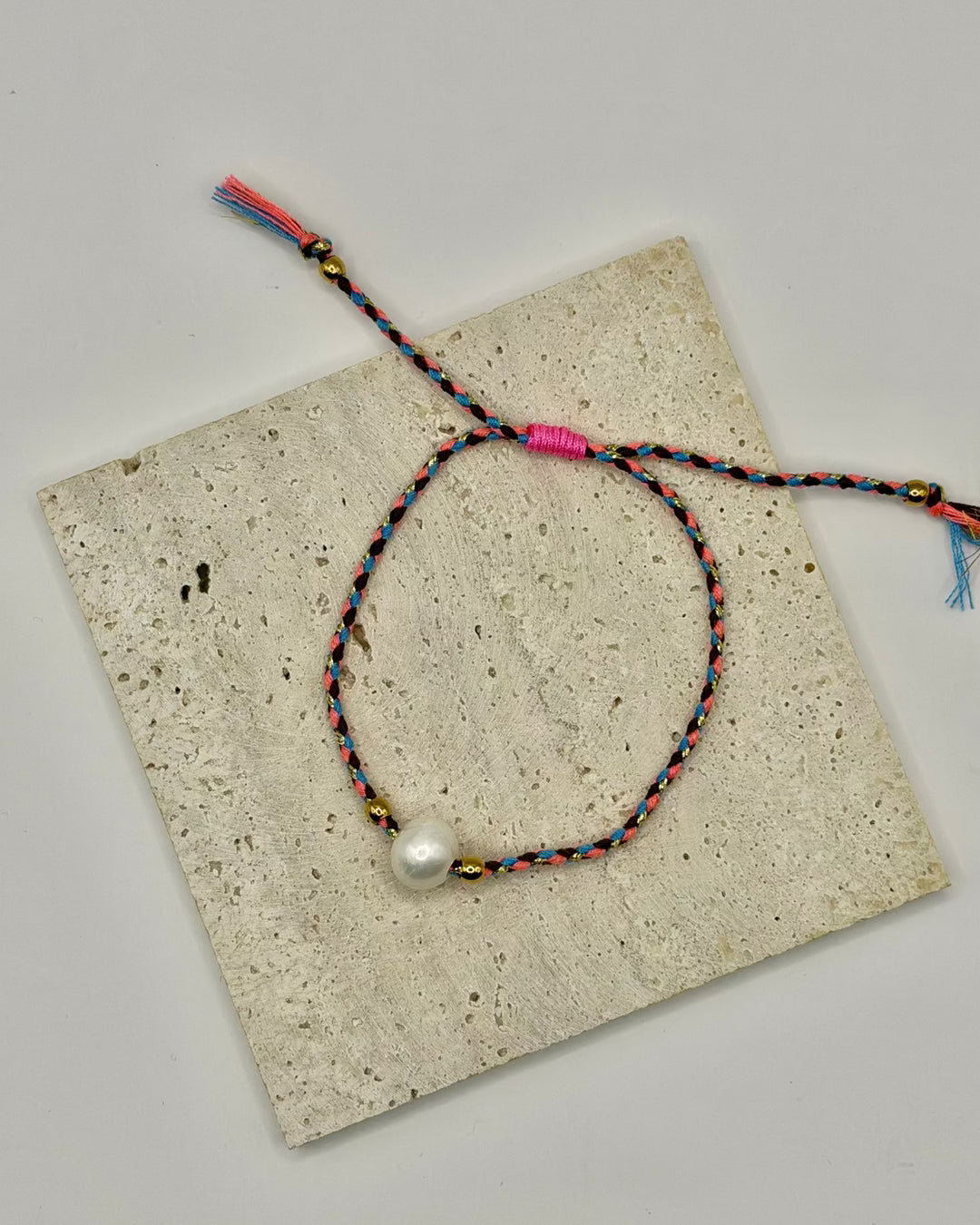 Freshwater Pearl Cord Bracelet stacked with other bracelets for a layered look
