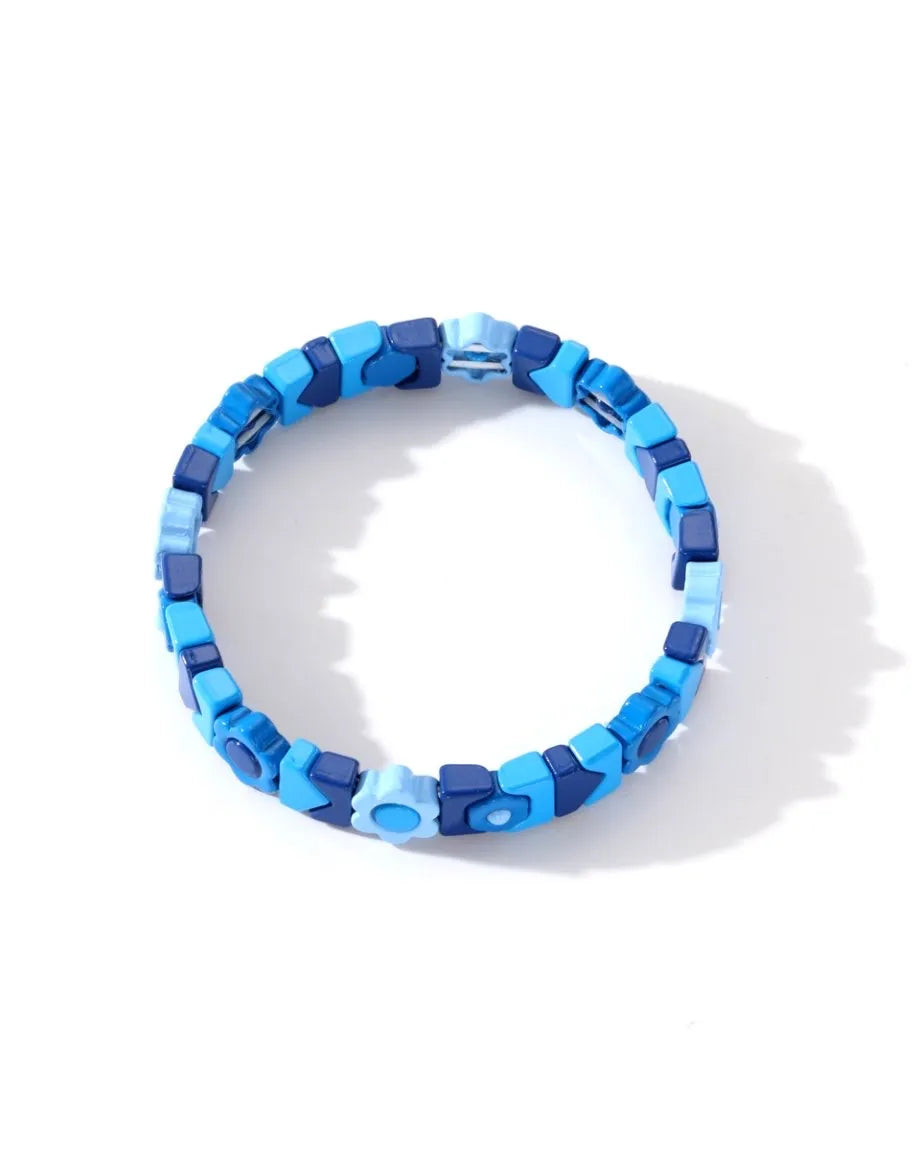 Blue beaded bracelet on a white background