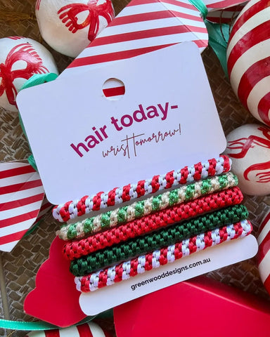 Candy Cane Christmas hair elastics by Greenwood Designs, set of five festive hair ties in red, green and gold, perfect for Christmas gifting and stocking fillers.