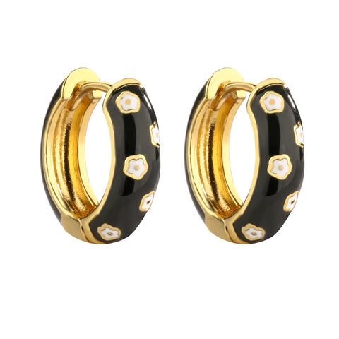 Jane black enamel chunky hoop earrings with white flower detail and gold trim by Greenwood Designs, shown on white background