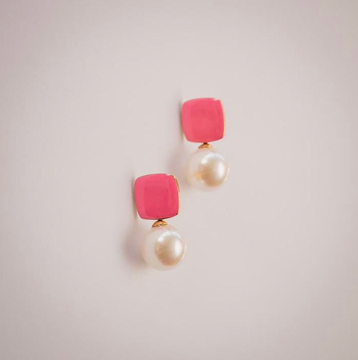 Felicity light pink enamel square stud earrings with faux pearl drop by Greenwood Designs, shown on neutral background