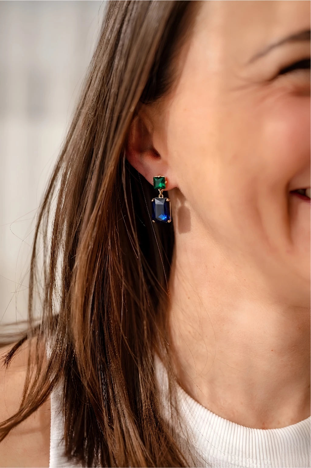Pippa Emerald and Navy Rectangle Crystal Statement Dangle Earrings featuring an emerald green square crystal stud top and deep navy blue rectangle crystal drop in a gold-toned prong setting, 4.5x1.8cm.