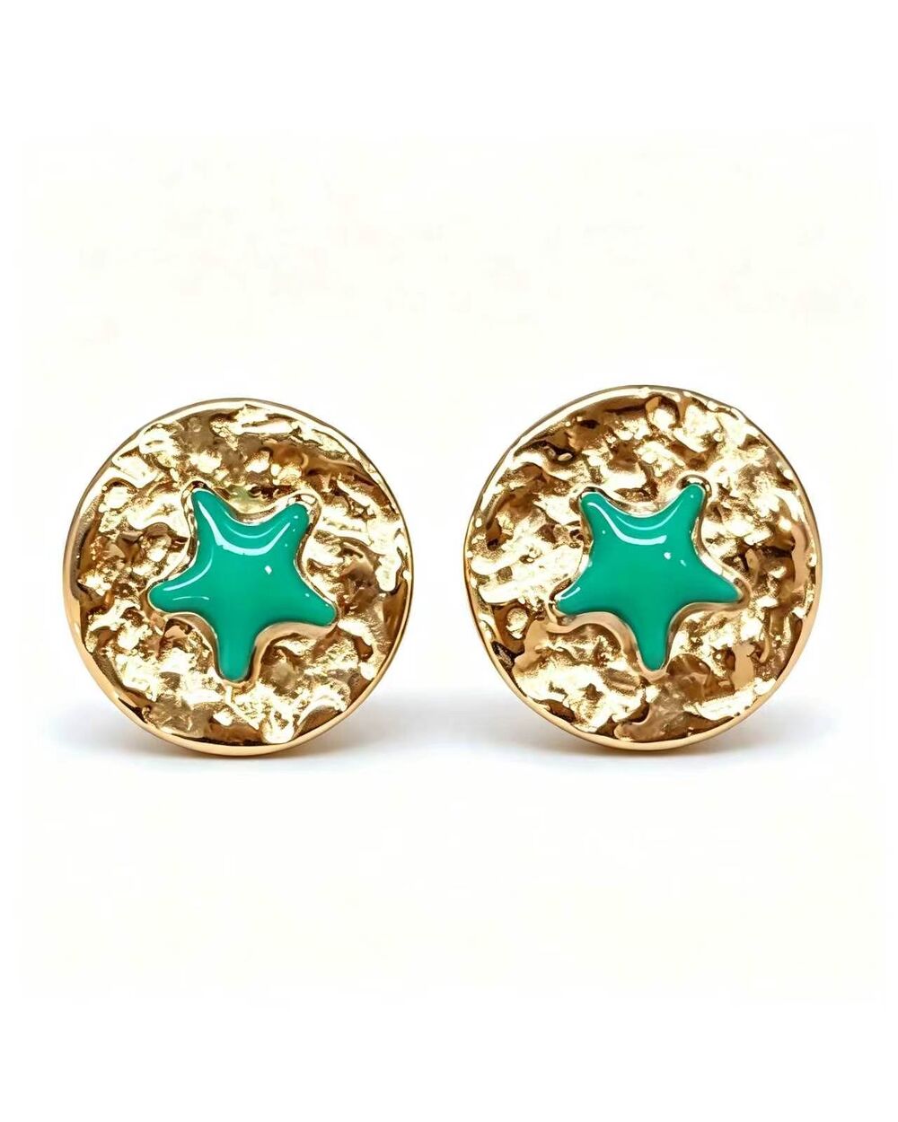 Gold stud earrings with a green enamel star at the centre