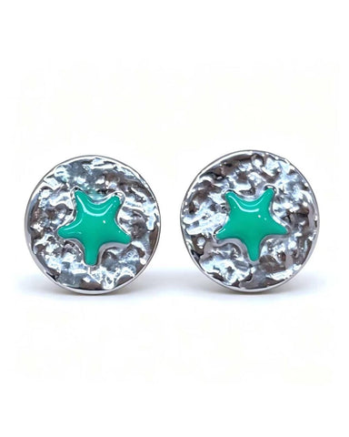 Silver stud earrings with a green enamel star at the centre