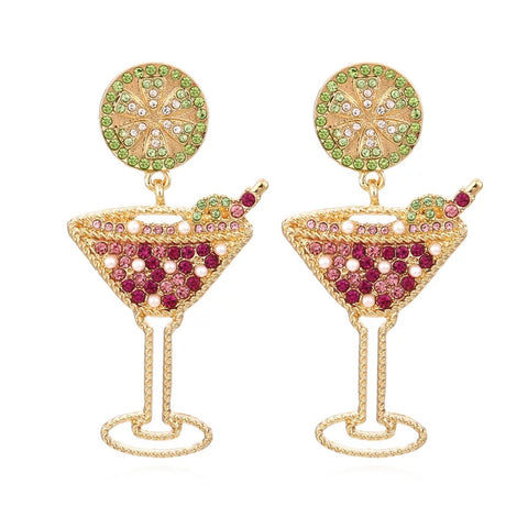 Martini Time pink and green crystal martini glass shaped drop earrings with pearl and lime slice detail by Greenwood Designs, shown on white background