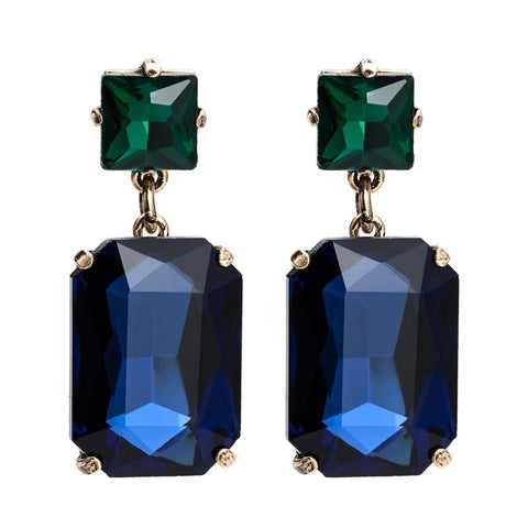 Pippa Emerald and Navy Rectangle Crystal Statement Dangle Earrings featuring an emerald green square crystal stud top and deep navy blue rectangle crystal drop in a gold-toned prong setting, 4.5x1.8cm.